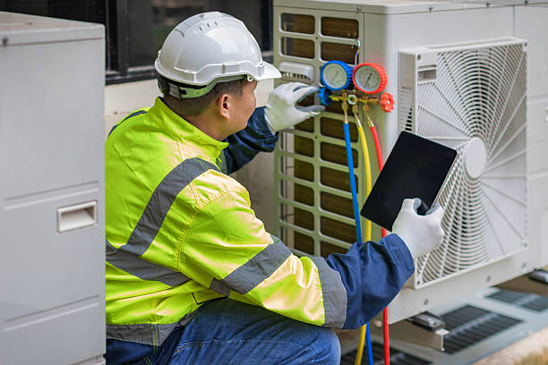 Professional Ductwork Repair technician working in Russells Point, OH